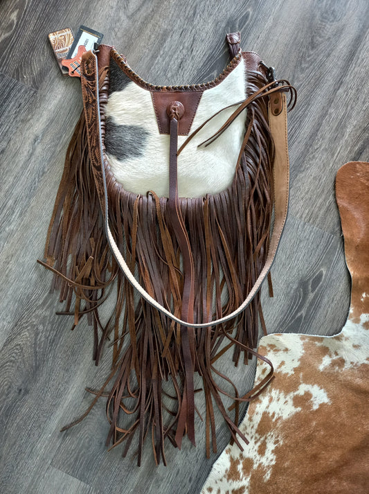 Plain cowhide bag with extra long tassels