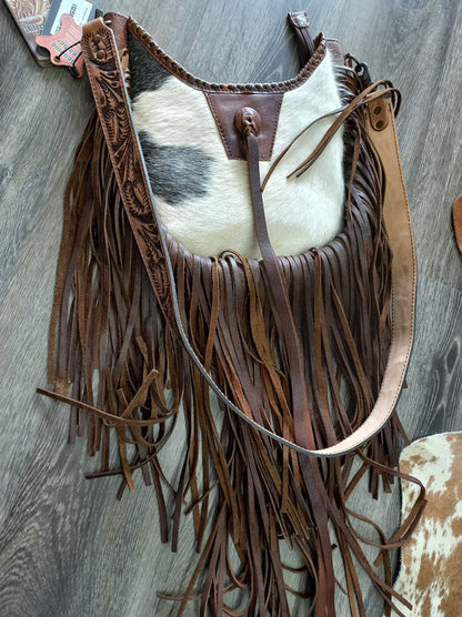 Plain cowhide bag with extra long tassels